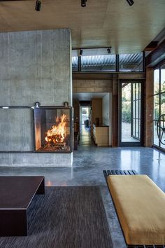 a living room with a fire place inside of it