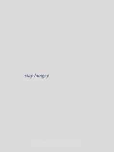 the words stay hungry written in blue ink