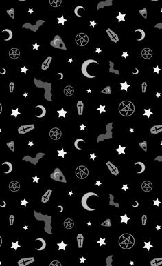 a black and white pattern with stars, crescents, and other symbols