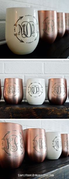 copper and white cups with monogrammed designs on them