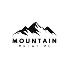 the mountain logo is black and white, with mountains in the background that says mountain creative