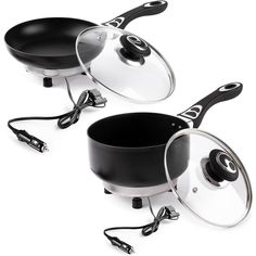 two pots and pans sitting next to each other on a white surface with black handles