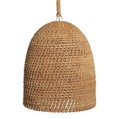 a hanging basket that is made out of straw and has a rope attached to it