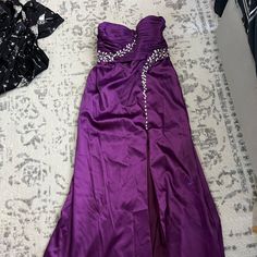 Never Worn. Excellent Condition Size 10 Evening Gown Purple Maxi Dress With Sweep Train, Floor-length Satin Dress For Homecoming, Purple Fitted Bodice Floor-length Maxi Dress, Purple Fitted Bodice Maxi Dress, Purple Floor-length Maxi Dress With Fitted Bodice, Purple Maxi Dress With Fitted Bodice, Purple Homecoming Dress With Sweep Train, Purple Satin Floor-length Maxi Dress, Purple Floor-length Dress For Homecoming