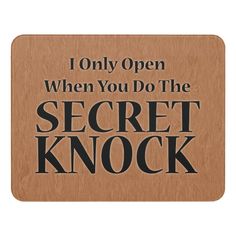 a wooden sign with the words, i only open when you do the secret knock