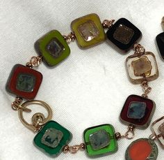 GEOMETRY:  Beautiful, individual, mesmerizing premium Picasso Czech glass beads.  Tarnish resistant brass looks like gold without the expense.  Everyday or add to special outfit for understated elegance.  Combine bracelets.  Last two pictures suggest possibilities.  (Price for one bracelet.) Square Beads, Square Bead, Scottsdale Az, Czech Glass Beads, Earth Tones, Matching Earrings, Czech Glass, Geometry, Apple Watch