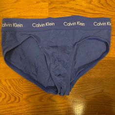 New And Unworn Calvin Klein Cotton Stretch Briefs. Blue/Purplish Color. Size Medium But Fits Smaller. Calvin Klein Blue Cotton Bottoms, Calvin Klein Brief, Calvin Klein Briefs, Carhartt Double Knee Pants, Tie Front Cardigan, Rayon Pants, Pleated Trousers, Leather Mary Janes, Hiking Pants