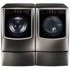 the front load washer and dryer side by side are both in stainless steel