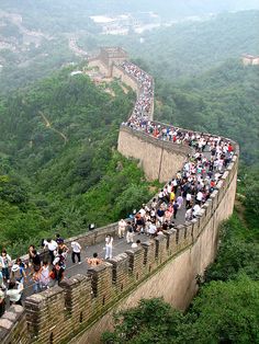 people walking on the great wall of china