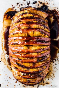 sliced bananas and chocolate sauce on top of a white plate