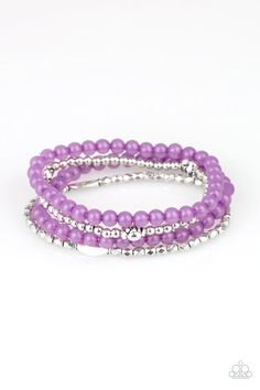 Mismatched silver beads and strands of glassy purple beads are threaded along stretchy bands. Infused with silver accents, dainty rose blossoms adorn the wrist for a seasonal finish. Sold as one set of four bracelets. #P9WH-PRXX-183XX Dainty Rose, Purple Beads, Purple Bracelet, Paparazzi Accessories, Stretchy Bracelets, Paparazzi Jewelry, Affordable Jewelry, Bracelet Collection, One Set