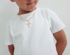 Children's Gold Cross Necklace, Gold Kids Dainty Cross Necklace, Baptism Gift for Him,  Toddler Baby Boy, Cross Unisex Cross ---------------------------------------------------------------------------------------- ♥ It comes packaged ready for gift giving :).  ♥ DETAILS - Material: 18k Gold Filled  - Nickel free hypoallergenic for sensitive skin - Lightweight, perfect for everyday wear ♥ SHIPPING  All orders will be shipped out within 1 business days after the order has been received. Orders shipped to the US take 2-4 business days to arrive. Canadian orders take about 7-14 business days to arrive. All other international orders take 7-21 business days to arrive.  ♥ GIFTS If you would like us to send the jewelry directly to the recipient, all you need to do is to put down the recipient add White Cross Pendant Necklace For Baptism, White Cross Necklace For Baptism, White Crucifix Necklace For Baptism, Cross Necklace Gold, Dainty Cross Necklace, Toddler Baby Boy, Boys Necklace, Gold Cross Necklace, Orders Shipped