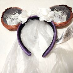 Up For Purchase Is A Brand New Nwt Disney Parks Headband Ears. The Are The Haunted Mansion Bride Constance Hatchaway. The Ears Are Bronze With An Image Of Constance And Her Groom Done In Sequin. The Bow Is White Flowers. The Back Of The Ears Has A White Veil. Haunted Mansion Bride, Constance Hatchaway, White Veil, White Veils, The Haunted Mansion, Bride Headband, Disney Accessories, Haunted Mansion, Disney Parks