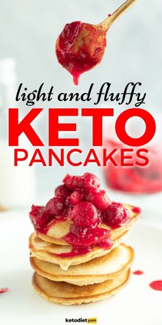 a white plate topped with pancakes covered in keto and cranberry toppings