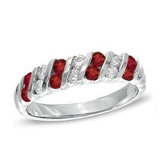 Chic and sophisticated, this glistening gemstone and diamond ring sets a stylish tone. Crafted in exquisite platinum, this on-trend design features diagonal channels that showcase duos of bright red rubies and sparkling diamonds across the band. Radiant with 1/4 ct. t.w. of diamonds and a brilliant buffed luster, this fashionable ring is a look she'll love to wear. Red Ruby Ring With Channel Set Diamonds, Red Diamond Channel Set Rings, Red Diamond Rings With Channel Set, Red Rings With Diamond Accents For Anniversary, Red Ruby Ring Channel Set For Wedding, Red Ruby Channel Set Ring For Wedding, Red Ruby Ring With Channel Set, Elegant Red Ruby Ring With Channel Set, Red Channel Set Ruby Ring For Wedding