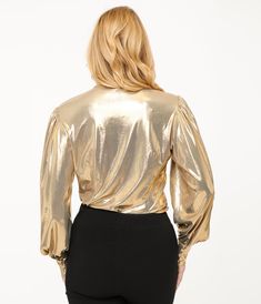 This elegant gold Gwen blouse from Unique Vintage features a stunning metallic shine that adds sophistication and character to any outfit. The long sleeves feature button cuffs while the metallic gold self-tie necktie adds a touch of class and completes the look. Complete with a button down front.Available in sizes XS-5X while supplies last. Shoe Gifts, Touch Of Class, Curated Gifts, Sweater Coats, Necktie, Vintage 1950s, Metallic Gold, Socks Women, Unique Vintage