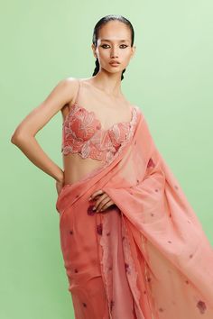 Peach fuzz chiffon saree with floral print and pearls and sequins embroidered border. Comes with a blouse. - Aza Fashions Sheer Blouse Piece For Wedding, Summer Wedding Georgette Blouse Piece, Summer Wedding Pre-draped Saree With Sheer Dupatta, Summer Georgette Designer Saree, Designer Georgette Saree For Summer, Designer Summer Georgette Saree, Summer Designer Georgette Saree, Wedding Chiffon Blouse With Pallu Detail, Wedding Chiffon Blouse With Pallu