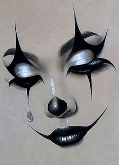 a drawing of a clown's face with teary eyes and nose rings on it