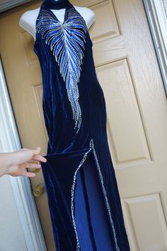 "Vintage 80s 90s Asian inspired blue velvety dress with beautiful beaded detail. No tags, estimated size large -see measurements. This lush beaded dress is stunning! the velvety fabric is super soft and luxurious!. This dress is in good condition. Measurements taken across front lying flat 17\" across front armpit to armpit -doubles to 34\" 15\" across waist 19\" across hips 53\" length" Formal Fitted Velvet Dress With Sequins, Fitted Velvet Sequin Dress, Formal Fitted Velvet Sequin Dress, Glamorous Fitted Velvet Dress With Sequins, Velvet Chinese Dress, Blue Fitted Velvet Dress, Festive Long Sleeve Fitted Cheongsam, Blue Fitted Cheongsam With Stand Collar, Vintage V-neck Sequin Dress