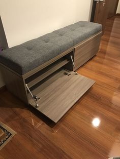 a bench that is on top of a hard wood floor