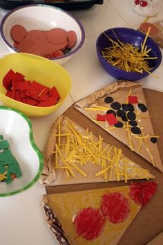 paper plates and bowls filled with different types of food