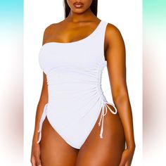 Women's One Shoulder Ruched One Piece Swimsuit Tummy Control High Cut Cheeky Bathing. 82% Nylon 18% Spandex. Ruched One Shoulder High Cut Cheeky One Piece Swimsuit Bathing Suit Monokini One Shoulder One Piece Swimsuit Features Ruched Drawstring Details, Great For Tummy Control And Slimming Look Sexy U-Neck, Backless, High Leg One Piece Swimsuit, Show Off Your Flattering Shape Removable Soft Padded, Wire Free, Adjustable Spaghetti Shoulder Straps, Flexiable Fit By Yourself Ruched One Shoulder Bat Stretch Swimwear With Ruched Sides For Summer, Summer Stretch Swimwear With Ruched Sides, Trendy Ruched Swimwear For Spring, Stretch Ruched Bodysuit For Swimming, Stretch Ruched Bodysuit For Beach Season, Spring Pool Bodysuit With Ruched Details, Party Swimwear With Ruched Sides And Stretch, Party Swimwear With Ruched Sides, Chic Ruched Swimwear For Summer