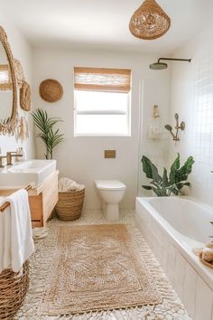 a bathroom with a rug, sink, toilet and bathtub