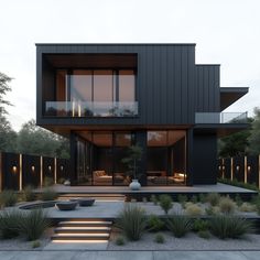 a modern house that is surrounded by plants