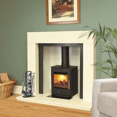 a fireplace with a wood burning stove in it