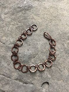 Men's copper bracelet of 14 ga. wire with hook closure. Length is 8.5 inches and is adjustable. Can be made to order if different length is needed. Bronze Metal Bracelets With Lobster Clasp, Bronze Metal Bracelet With Lobster Clasp, Bronze Copper Bracelets For Jewelry Making, Adjustable Nickel-free Rust-colored Jewelry, Adjustable Rust-colored Nickel-free Jewelry, Handmade Adjustable Rose Gold Chain Bracelet, Bronze Electroformed Metal Bracelet, Adjustable Bronze Copper Bracelets, Copper Bracelets With Lobster Clasp For Gift