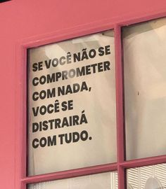 there is a sign in the window that says, sevoce nao se comprometer com nadda, voce se distraia / distraia com tudo