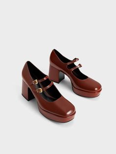 Channel old-school glamour with these vintage-inspired Mary Janes. A classy design set on sturdy block heels, these shoes offer effortless versatility and comfortable all-day wear. In flattering cognac with a high-shine finish, they will complement, and add a subtle shine, to a wide range of outfits. Style them with crop blazers and mini-skirts for a quirky and youthful after-dark look. Cute Heels Classy, Charles And Keith Shoes, Heel Mary Janes, Charles And Keith, Chunky Ankle Boots, Platform Chelsea Boots, Online Shopping Shoes, Patent Shoes, Faux Leather Heels