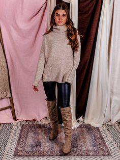 Our In Session Turtleneck Sweater is a must this season! This gorgeous taupe sweater is made from a soft, cozy and stretchy knit fabrication, and features a longer length and long sleeves to keep you warm all season long. Dress it up with jeans and booties for a stylish look, or pair it with leggings and sneakers for a casual-cool outfit. Whatever your style, this sweater is sure to become one of your favorites this season! Color: Taupe Relaxed Fit Ribbed Hemline + Cuffs Turtleneck Long Sleeves Neutral Winter Outfit, Def Leopard, Taupe Sweater, High Boots Outfit, Boots And Leggings, Sweater Dress Outfit, Corporate Outfits, Cropped Cardigan Sweater, Sherpa Jacket