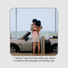 two people hugging each other in front of a car with the caption, i knew i was in love with you when i tried at the thought of losing you