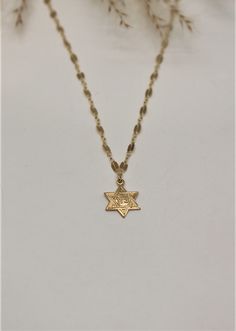 "This effortless classic look is great to wear everyday and the absolute perfect gift for Jewish holyday Bat mitzva .... Its dainty, meaningful and chic! This necklace is extremely light to achieve the dainty look and this necklace is great when its a bit shorter Perfect for layering necklaces L E T S . T A L K . N E C K L A C E S ✤ Available in 14k Gold Filled or Sterling Silver ✤ Star of David measures about 13mm ✤ Model is wearing size - 14\" ✤ Available sizes * Please choose in drop down box Classic Star Shaped Necklace For Gift, Classic Star-shaped Necklace As Gift, Classic Star-shaped Necklace For Gift, Classic Star Of David Jewelry For Gift, Classic Star Of David Necklace For Gift, Classic Star Of David Necklace As Gift, Magen David Necklace, Star Of David Necklace, Tiny Cross