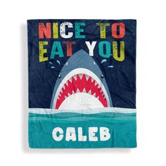 a towel that says nice to eat you with a shark in the ocean on it