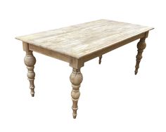 an old wooden table with turned legs on a white background