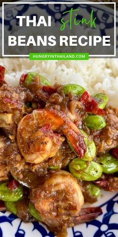 a blue and white plate topped with rice and shrimp