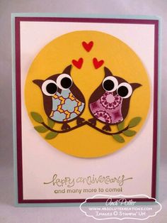 a card with two owls sitting on top of each other