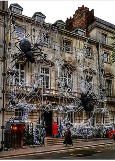 a large building with spider webs on it's side