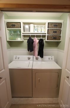 a washer and dryer in a small room