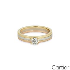 For Sale on 1stDibs - A gorgeous 18k tri-colour gold diamond ring by Cartier from the Trinity de Cartier collection. The ring is set to the centre with a 0.24ct round brilliant Cartier Diamond Ring Brilliant Cut, Cartier Diamond Ring With Brilliant Cut For Anniversary, Cartier Single Diamond Round Cut Jewelry, Cartier Jewelry With Single Round Cut Diamond, Cartier Brilliant Cut Diamond Ring For Anniversary, Cartier Diamond White Brilliant Cut Diamond Ring, Cartier Diamond Ring Brilliant Round Cut, Cartier Diamond White Fine Jewelry Diamond Ring, Cartier Diamond Wedding Rings Brilliant Cut