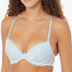 Seductive And Ornate, This Calvin Klein Seductive Comfort With Lace Lift Demi Bra Is Crafted With Oversized Floral Lace Embellishments And Underwire Support, Providing The Perfect Lift For Every Size. Underwire Support Padded Push-Up Cups Lightweight. Elegant Light Blue Bra With Padded Cups, Elegant Light Blue Padded Bra, Elegant Light Blue Bra, Elegant Blue Seamless Bra, Elegant Calvin Klein Bra With Built-in Support, Elegant Calvin Klein Underwire Bra, Calvin Klein Elegant Underwire Bra, Fitted Elegant Calvin Klein Bra, Elegant Fitted Calvin Klein Bra