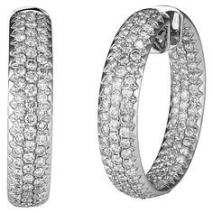 18 Karat White Gold Pave In and Out Diamond Hoop Earrings Featuring 8.31 Carat Total Weight Round Brilliant Cut Diamonds Of VS Clarity & G/H Color. 1.5 Inch Diameter. Open Heart Design At Back With Hinge Closure. Finished Weight Is 32.6 Grams. Luxury White Diamond-cut Hoop Earrings, Luxury White Gold Dazzling Hoop Earrings, Diamond Hoop Earrings, G H, Jewelry Earrings Hoops, Micro Pave, High Jewelry, Round Brilliant Cut Diamond, Large White