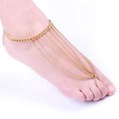 Treat your toes to timeless elegance thanks to this dainty anklet and toe ring set that flaunts shimmering 18k gold-plated chains for beauty in every glance. Anklet: 8.66" L with 2.36" extender Linking Chain : 2.95" L Lobster claw clasp 18k gold-plated copper Tassel Anklet, Dainty Anklet, Toe Ring, Toe Rings, Gold Plated Chains, Delicate Bracelet, Lobster Claw, Ring Set, Ring Sets