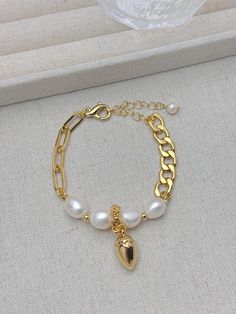 Handcrafted Natural Freshwater Pearls Each pearl is unique and different  Size: 16-22cm adjustable with 18K gold plated copper accessories Exquisite packaging Gold Pearl Charm Chain Bracelet, Gold Pearl Bracelet With Adjustable Chain, Gold Metal Pearl Bracelet With Pearl Charm, Gold Pearl Bracelet With Metal Charm, Gold Plated Pearl Bracelet With Adjustable Chain As Gift, Gold Pearl Chain Bracelet With Adjustable Chain, Gold Adjustable Pearl Bracelet, Gold Pearl Bracelets With Adjustable Chain, Gold Plated Chain Bracelet With Pearl Charm