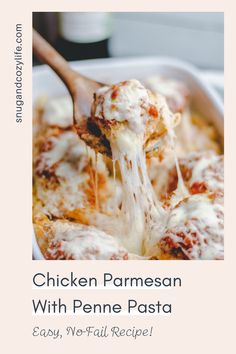 chicken parmesan with penne pasta in a white casserole dish on a wooden spoon