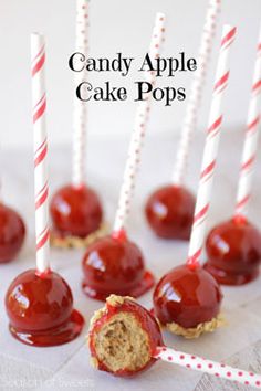 candy apples with white and red striped sticks