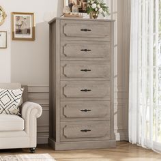 a living room scene with focus on the chest of drawers