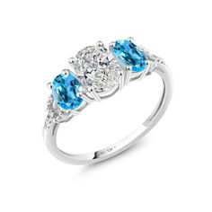 three stone diamond and blue topaz ring in 18k white gold with 0 00ct diamonds